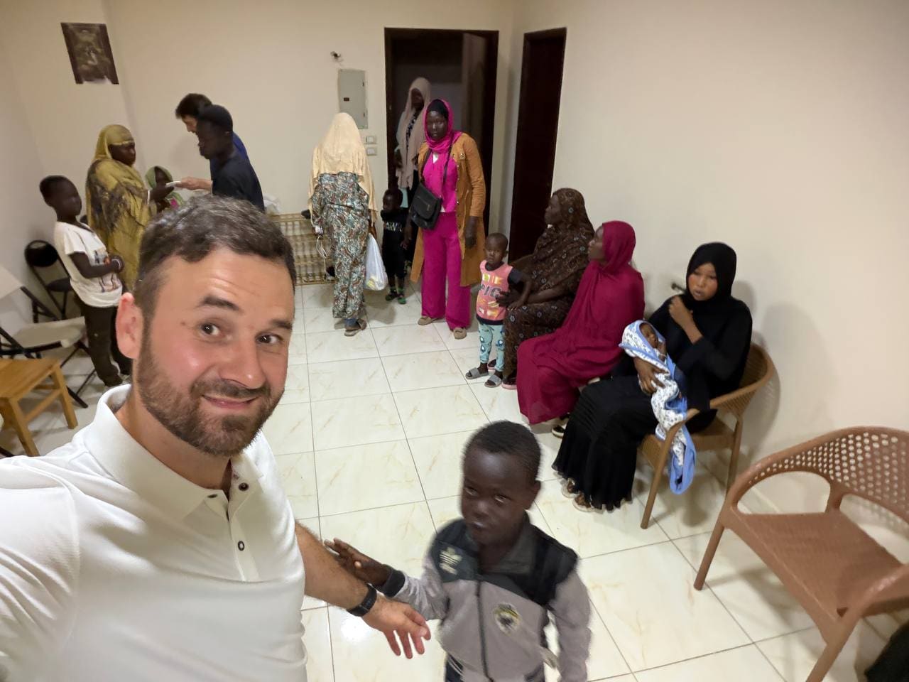 Pastor Raushan with Sudanese refugee families at gathering